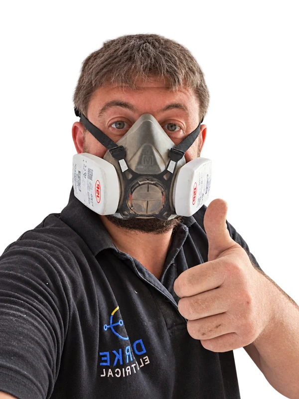 Paul giving a thumbs up while at work